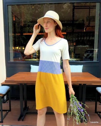 IMG 8769 ELOE II.- summer dress Summer dress with short sleeves with a knitted cream top and a yellow skirt made of flowing fabric made of viscose silk and a blue and white striped waist. The neckline is lined with the same blue and white stripe. Top composition - cotton + elastane + modal They will immediately become your favorite piece, suitable for almost all characters. Size.S All materials are already pre-washed, so they will not shrink! Easy maintenance - wash for a delicate program up to 30 degrees. MADE WITH LOVE IN CZECH REPUBLIC! Summer dress with short sleeves with a knitted cream top and a yellow skirt made of flowing fabric made of viscose silk and a blue and white striped waist. The neckline is lined with the same blue and white stripe. Top composition - cotton + elastane + modal They will immediately become your favorite piece, suitable for almost all characters. Size.S All materials are already pre-washed, so they will not shrink! Easy maintenance - wash for a delicate program up to 30 degrees. MADE WITH LOVE IN CZECH REPUBLIC!