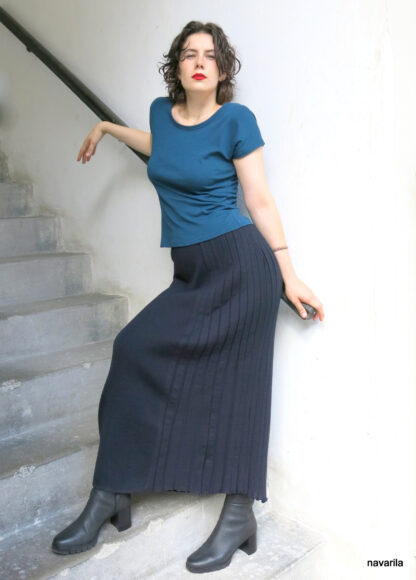 IMG 0860 HÁTA-maxi skirt with pleats The maxi-length, slightly widened skirt is widened in half on the back and front part with a pleated part, knitted from woolen merino yarn from an Italian manufacturer. two colors : 1/black 2/navy blue in length 85cm or 95cm. Beautiful and easy-to-maintain yarn from an Italian manufacturer in the composition of 50% merino wool + 50% polyester. Each model is already pre-washed - maintenance is very practical - washing in the washing machine on a delicate program. Made with love in the Czech Republic, each piece original - handmade. Delivery time within 14 days after ordering. Size S,M,L,XL The maxi-length, slightly widened skirt is widened in half on the back and front part with a pleated part, knitted from woolen merino yarn from an Italian manufacturer. two colors : 1/black 2/navy blue in length 85cm or 95cm. Beautiful and easy-to-maintain yarn from an Italian manufacturer in the composition of 50% merino wool + 50% polyester. Each model is already pre-washed - maintenance is very practical - washing in the washing machine on a delicate program. Made with love in the Czech Republic, each piece original - handmade. Delivery time within 14 days after ordering. Size S,M,L,XL