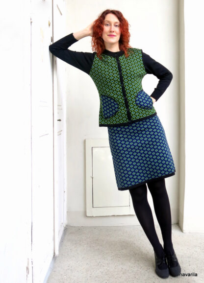 IMG 1826 NEMO II.- patterned jacket with pockets Blue-green patterned jacket with black sleeves and decorative pockets. Knitted with a jacquard pattern from cotton yarn, it guarantees the softest texture to all that is wool. Black sleeves, collar and placket, button fastening. Slightly tapered at the waist. It is possible to add a skirt of the same pattern in the opposite color. Yarn composition - 50% cotton + 50% polyester. All our models are already pre-washed, and the material does not bite, and does not pill - very practical maintenance - washing in the washing machine on a gentle program up to 30 degrees. Only one original model - size M Other sizes on order within 14 days. Blue-green patterned jacket with black sleeves and decorative pockets. Knitted with a jacquard pattern from cotton yarn, it guarantees the softest texture to all that is wool. Black sleeves, collar and placket, button fastening. Slightly tapered at the waist. It is possible to add a skirt of the same pattern in the opposite color. Yarn composition - 50% cotton + 50% polyester. All our models are already pre-washed, and the material does not bite, and does not pill - very practical maintenance - washing in the washing machine on a gentle program up to 30 degrees. Only one original model - size M Other sizes on order within 14 days.