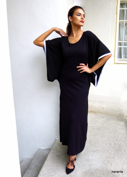 IMG 3065 MYOKO-black kimono maxi dresses with white trims Simple and sexy, for day and night is a kimono dress-tunic, with 3/4 sleeves kimono sleeves, lined with a white hollow and with a round neckline. Extended-length max. We also offer a midi version: We also offer a striped version: 50/50 cotton yarn with polyester admixture. Very easy maintenance - wash on a gentle program by hand or in the washing machine up to 30 degrees. After washing, spread on a towel. Simple and sexy, for day and night is a kimono dress-tunic, with 3/4 sleeves kimono sleeves, lined with a white hollow and with a round neckline. Extended-length max. We also offer a midi version: We also offer a striped version: 50/50 cotton yarn with polyester admixture. Very easy maintenance - wash on a gentle program by hand or in the washing machine up to 30 degrees. After washing, spread on a towel.